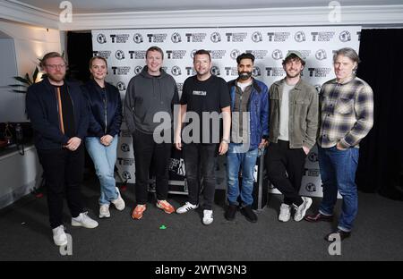 (left to right) Rob Beckett, Joanne McNally, Joe Lycett, Kevin Bridges, Paul Chowdhry, Seann Walsh, and John Bishop backstage during A Night of Comedy, the Teenage Cancer Trust show at the Royal Albert Hall, London. Picture date: Tuesday March 19, 2024. Stock Photo