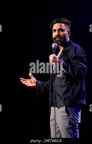 Paul Chowdhry on stage during A Night of Comedy, the Teenage Cancer Trust show at the Royal Albert Hall, London. Picture date: Tuesday March 19, 2024. Stock Photo