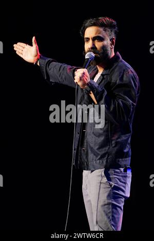 Paul Chowdhry on stage during A Night of Comedy, the Teenage Cancer Trust show at the Royal Albert Hall, London. Picture date: Tuesday March 19, 2024. Stock Photo