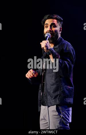 Paul Chowdhry on stage during A Night of Comedy, the Teenage Cancer Trust show at the Royal Albert Hall, London. Picture date: Tuesday March 19, 2024. Stock Photo