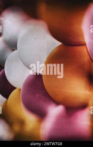 Vivid colors and organic shapes merge to form an abstract pattern with a playful and bold presence Stock Photo