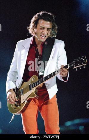 Verona Italy 10/09/1999 : Federico Poggipollini, Italian guitarist of the Ligabue band during the live concert at the Arena Stock Photo