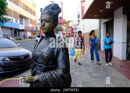 The statue of ancient Chinese figures decorated the street of Chinatown Barrio Chino in Santo Domingo.Santo Domingo.Dominican Republic Stock Photo