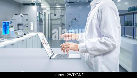 Worker or scientist wears lab coat work in laboratory Stock Photo