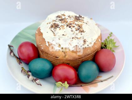 Easter cake, Easter eggs, willow branches, candles, holy water are symbols of the bright holiday of the Resurrection of Christ. Stock Photo