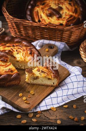 Freshly baked apple pie on a cutting board with a rustic background Stock Photo