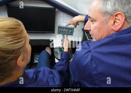she is using a computer simulator Stock Photo
