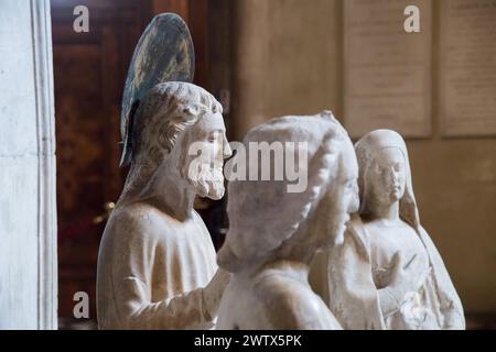 Gothic marble funerary monument to Cardinal Guglielmo Longhi by Ugo da Campione from XIV century in Lombard Romanesque Basilica di Santa Maria Maggior Stock Photo