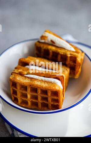 Close-up of a bowl of homemade waffles filled with marshmallows on a table Stock Photo