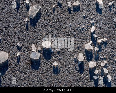 blocks of ice on the asphalt Stock Photo