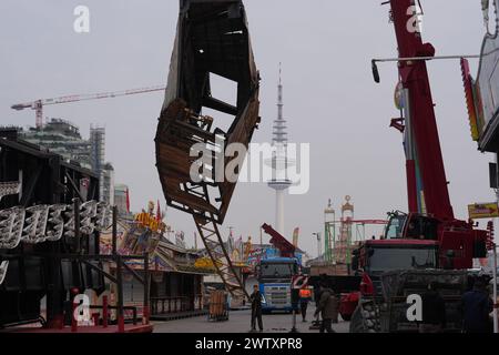 Hamburg, Germany. 20th Mar, 2024. Employees set up a ride on the Heiligengeistfeld. The Hamburg Spring Dome starts on March 22. Credit: Marcus Brandt/dpa/Alamy Live News Stock Photo