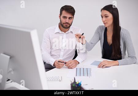 Business, collaboration and data analysis on computer with teamwork or conversation in finance office. Accounting, report and people review financial Stock Photo