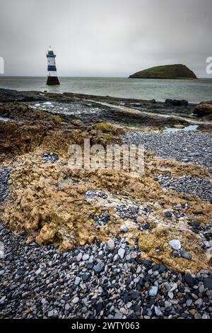 Penmon lighthouse close by Puffin island on Anglesey, Ynys Mon North Wales. Stock Photo