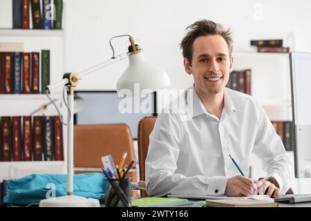 Male student preparing for exam  at home Stock Photo