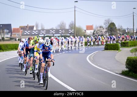 De Panne, Belgium. 20th Mar, 2024. The pack of riders pictured in action during the 'Classic Brugge-De Panne' men's elite one-day cycling race, 198, 9 km from Brugge to De Panne, Wednesday 20 March 2024. BELGA PHOTO LAURIE DIEFFEMBACQ Credit: Belga News Agency/Alamy Live News Stock Photo