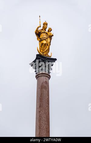 Virgin Mary's Column or Mariensaule at the famous square of Marienplatz in Munich, Bavaria, Germany. Stock Photo