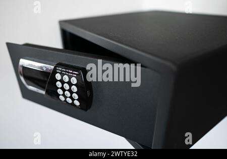 Black small home or hotel safe with keypad. Stock Photo
