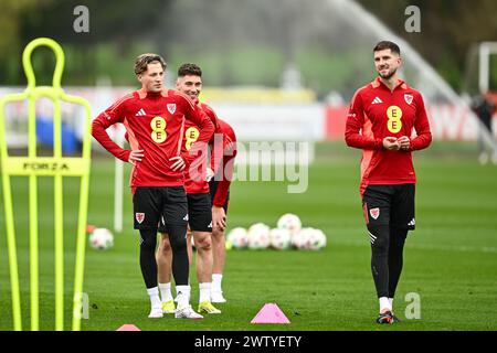 Chris Mepham and Charlie Savageof Wales during warms up ahead of the Wales open training session at Vale Resort Training complex, Hensol, United Kingdom, 20th March 2024  (Photo by Craig Thomas/News Images) Stock Photo