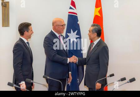 Canberra, Australia. 20th Mar, 2024. Chinese Foreign Minister Wang Yi (R), also a member of the Political Bureau of the Communist Party of China Central Committee, meets with Peter Dutton (C), leader of the federal opposition, in Canberra, Australia, March 20, 2024. Simon Birmingham, the opposition's foreign affairs spokesperson, was present. Credit: Chu Chen/Xinhua/Alamy Live News Stock Photo