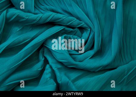 A Teal blue fabric overlapping pattern on the center Stock Photo