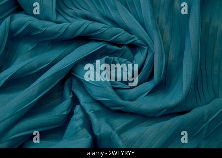 A Teal blue fabric overlapping pattern on the center Stock Photo