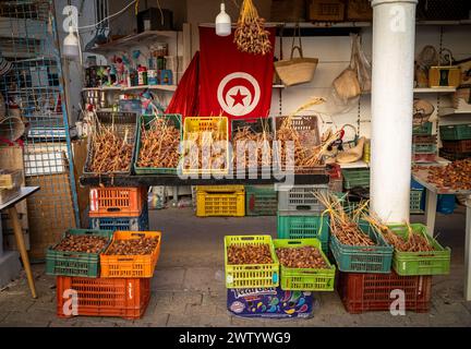 A shop with a Tunisian flag on display sells resh dates, Monastir, Tunisia Stock Photo