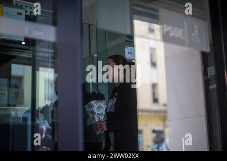 A pro-Palestinian protester holds a bouquet of black roses during a demonstration in front of the headquarters of the PSOE (Spanish Socialist Workers Party), the official party of the Spanish government to demand an end to arms sales to Israel. Protesters from the Solidarity Network against the Occupation of Palestine in Spain delivered a petition demanding an end to the arms trade between Spain and Israel and a bouquet of black roses, addressed to Pedro Sanchez, President of the Government of Spain and general secretary of the PSOE (Party Spanish Socialist Workers). (Photo by Luis Soto/SOPA Stock Photo