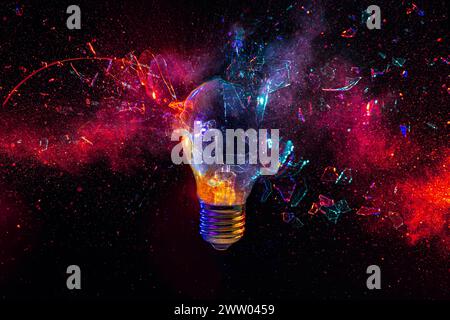 Abstract image of an exploding light bulb with a cosmic background Stock Photo