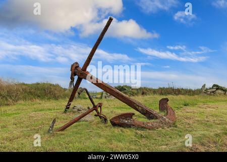 Two old rusty anchors in a field, Cornwall, England, UK Stock Photo