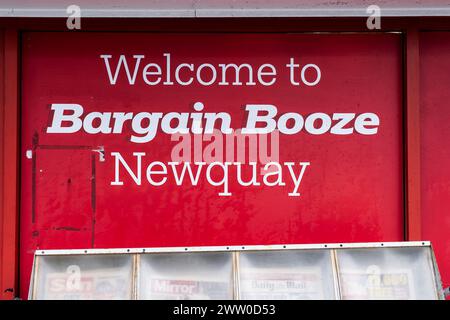 A sign outside a Bargain Booze shop store in Newquay town centre in Cornwall in the UK. Stock Photo