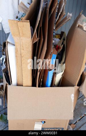 a bunch of recycle ready cardboard boxes folded into a large box Stock Photo