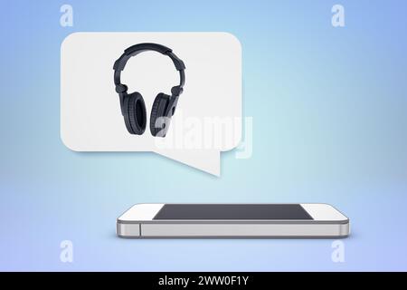 Modern black headphones above a smartphone Stock Photo