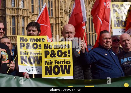 London, UK. 20th Mar, 2024. Protesters hold 'No more P&Os' placards during the demonstration. Members of the trade unions RMT, TUC and Nautilus gathered outside the Parliament on the second anniversary of P&O Ferries firing nearly 800 workers, calling for a new deal for workers and an end to Fire and Rehire. Credit: SOPA Images Limited/Alamy Live News Stock Photo