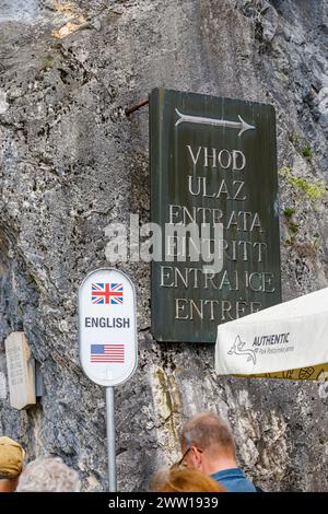 English entrance queue sign at Postojnska Jama (Postojna Cave Park), an iconic natural karst cave system in Slovenia, central & eastern Europe Stock Photo