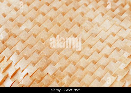 Sliced brown paper for packaging. Using recyclable materials. Texture, background. Stock Photo