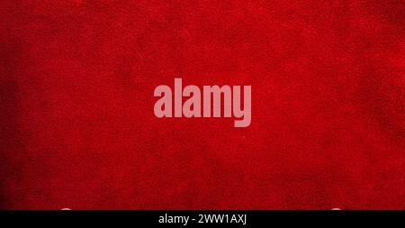 Red velvet material web size. Suede genuine leather is red as a background. Stock Photo
