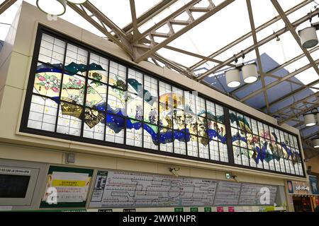 Furusato: Flowers of Japan by Ikuo Hirayama, stained glass artwork inside Ueno station – Taito City, Tokyo, Japan – 28 February 2024 Stock Photo