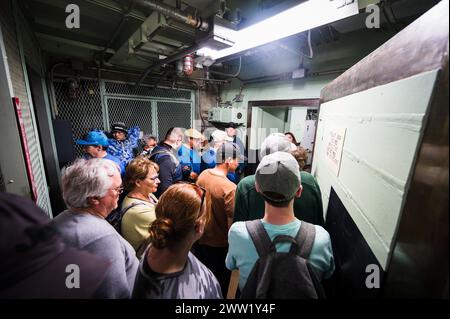 The Titan Missile Museum, which houses a decommission Titan II nuclear ICBM missile.  Tourists inside the silo complex.  South of Tucson Arizona, USA. Stock Photo