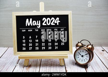 May 2024 monthly calendar on chalkboard for planning and management Stock Photo