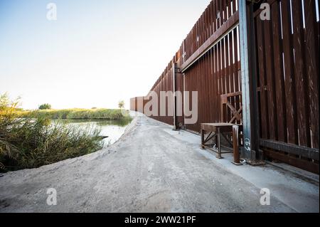 The US border wall between Yuma Arizona and Los Algodones Mexico. Stock Photo