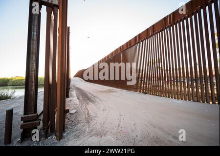 The US border wall between Yuma Arizona and Los Algodones Mexico. Stock Photo