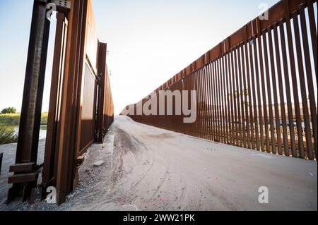 The US border wall between Yuma Arizona and Los Algodones Mexico. Stock Photo