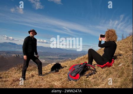 Mature couple hiking on the mountain ridge Stock Photo