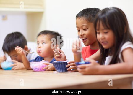 Kids eating shaved ice Stock Photo