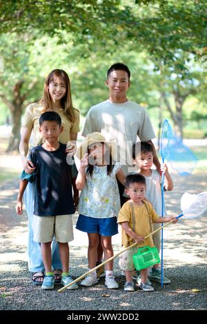 Asian family at the park Stock Photo