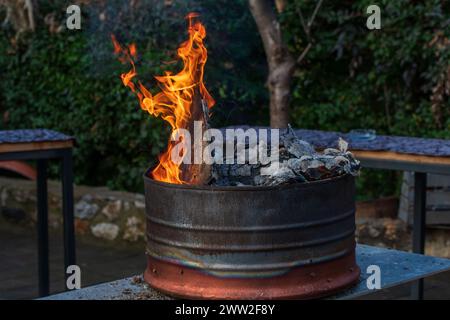 Campfire chronicles. Tales around the open air flames. Stock Photo