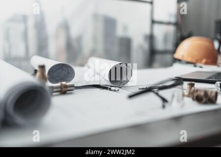 Architecture plans and city route map on engineer workplace. Stock Photo