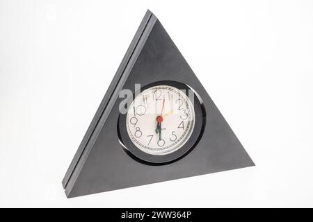 Clock in a triangular mount Stock Photo