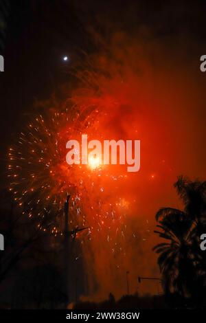 The beautiful fireworks of different colors and shapes exploding in the sky of Valencia during the Fallas celebration Stock Photo