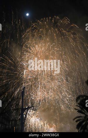 The beautiful fireworks of different colors and shapes exploding in the sky of Valencia during the Fallas celebration Stock Photo